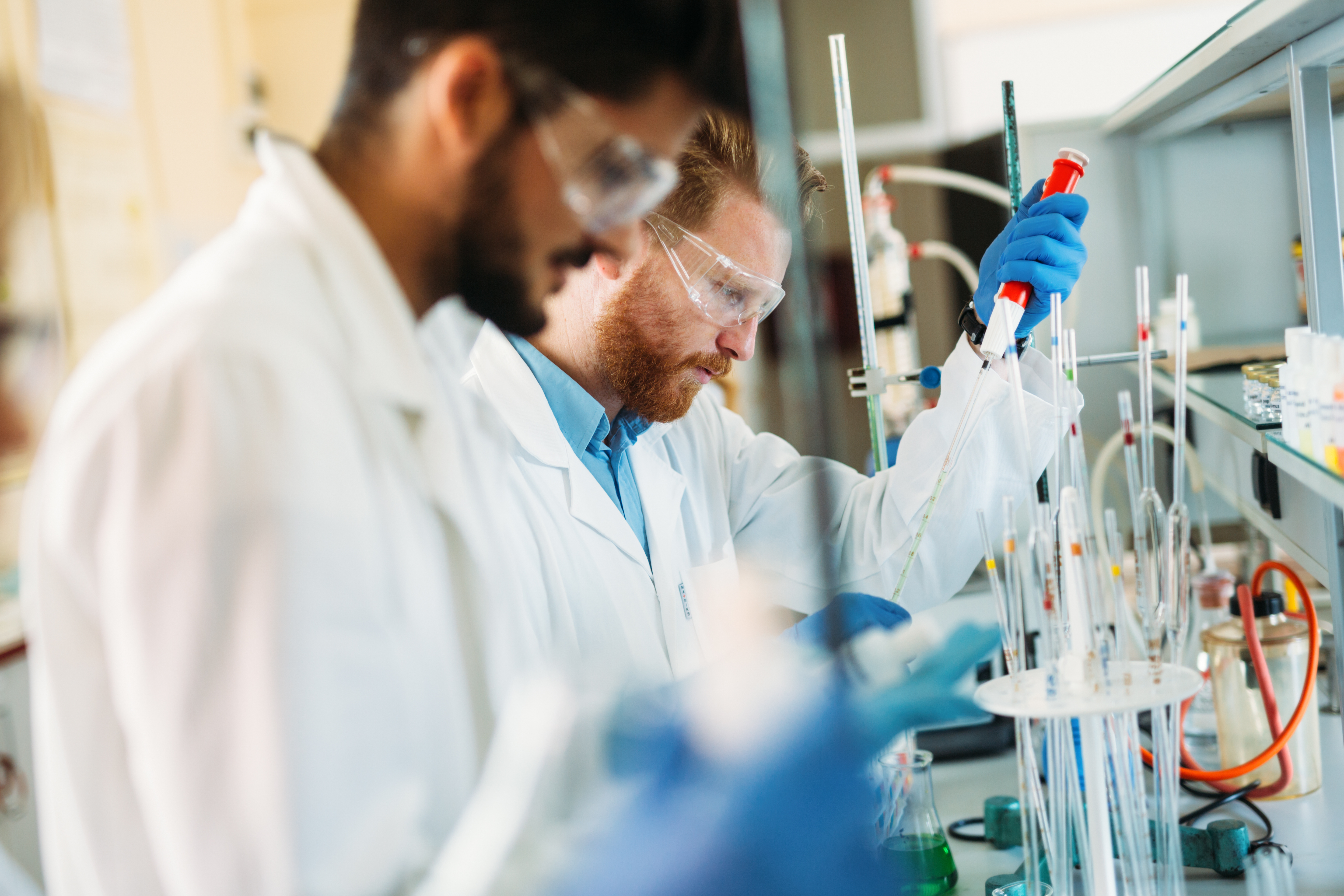 Two men conducting research in a lab setting