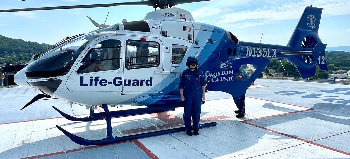 Baylee Slagle stands in front of a Life-Guard air ambulance after shadowing the crew for a day, an experience that inspired her goal of becoming a flight nurse.