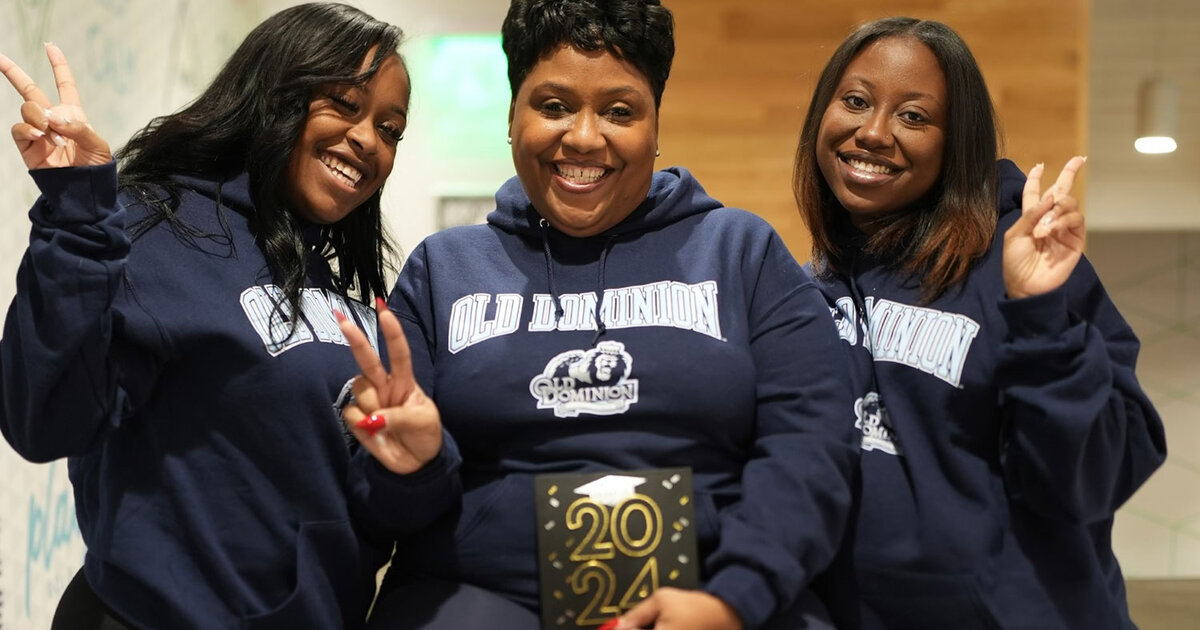 ODU alumnae Jordyn Harrell, left, and Jasmyn Harrell flank their mother Celeste Harrell, who is scheduled to graduate from ODU in May 2023.