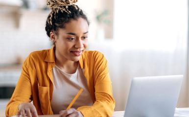 Student working at home on a laptop