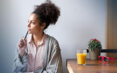 Female student sitting at a table