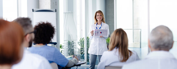 Doctor leading a conference workshop