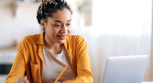Student working at home on a laptop