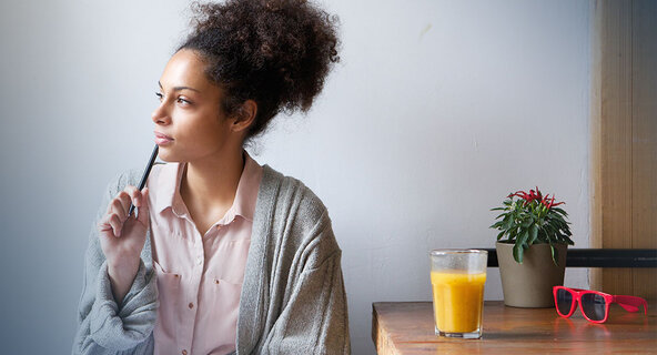 Female student sitting at a table