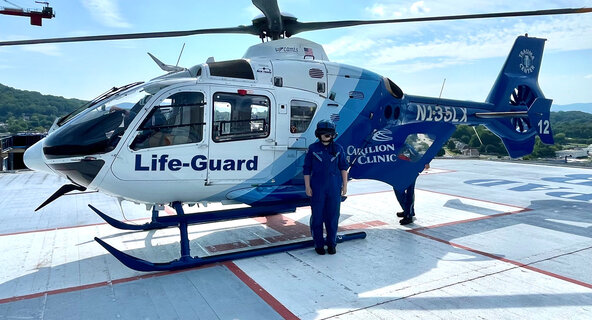 Baylee Slagle stands in front of a Life-Guard air ambulance after shadowing the crew for a day, an experience that inspired her goal of becoming a flight nurse.