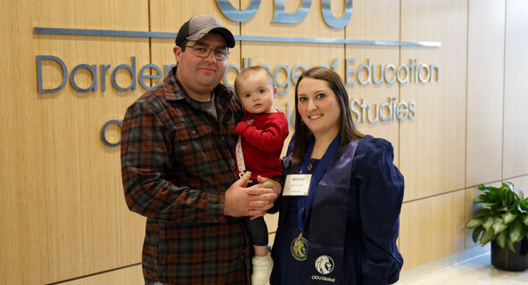 With her husband, Austin, and daughter, Elaine, Emily Collins ’25 marks the completion of Old Dominion University’s master’s in education with a math specialist concentration.
