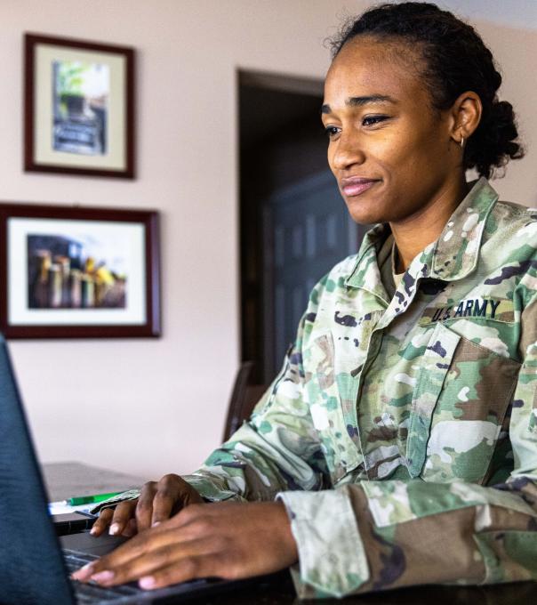  Military service member at computer searching ODUGlobal programs