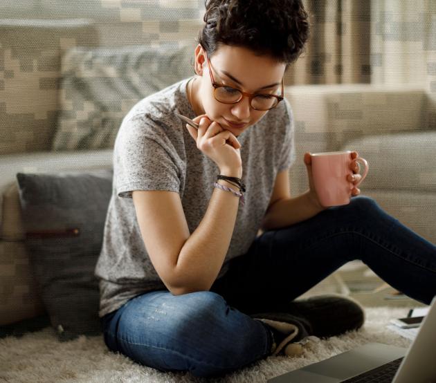 woman studying online with military background