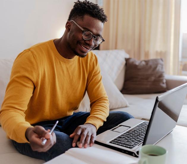 A student looks at his computer.