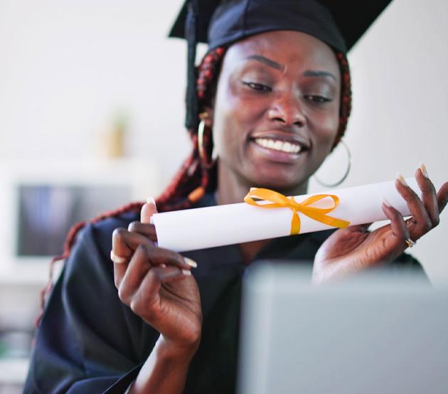 Woman holding a diploma