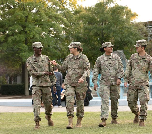 Military members walking on campus talking about how to transfer military credits to ODUGlobal