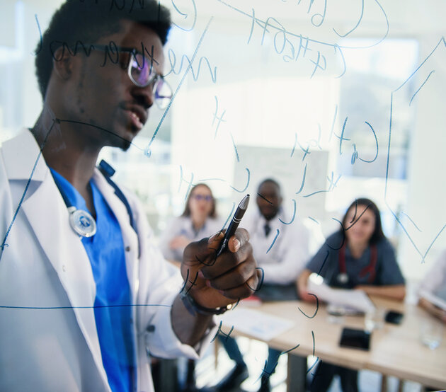 Medical educator leading a lecture