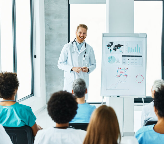 Medical educator leading a presentation