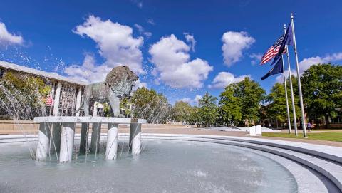 View of Old Dominion University's Monarch Fountain, containing a bronze lion statue, on Kaufman Mall.