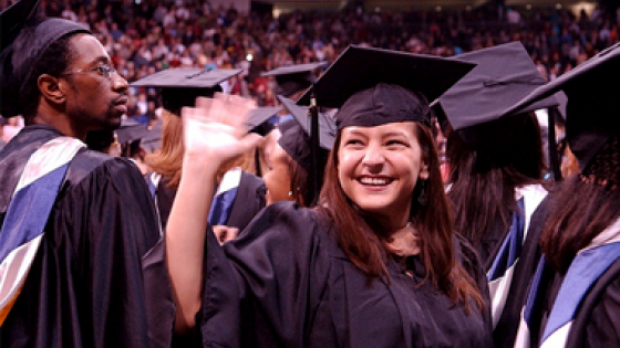 Graduate at Commencement Waving
