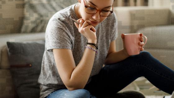 woman studying online with military background