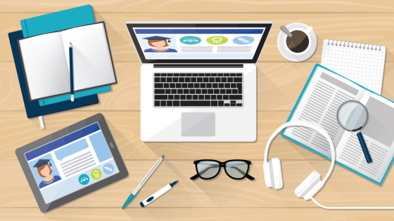 Illustration of a student's desk with latop, books, and tablet for completing a bachelor's degree online.