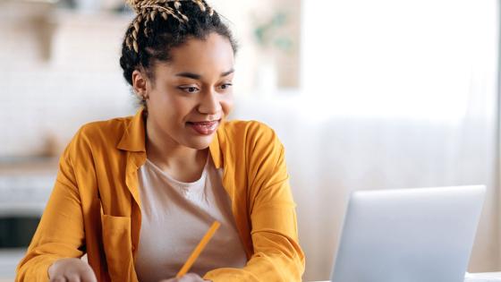 Student working at home on a laptop