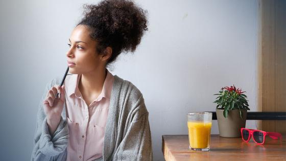 Female student sitting at a table