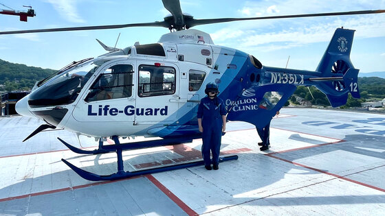 Baylee Slagle stands in front of a Life-Guard air ambulance after shadowing the crew for a day, an experience that inspired her goal of becoming a flight nurse.