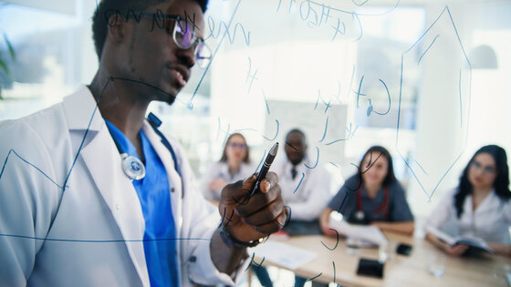 Medical educator leading a lecture