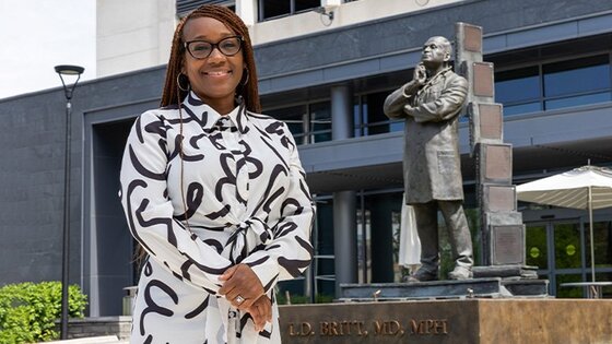Miasha O'Neal, Doctor of Health Sciences graduate from Macon & Joan Brock Virginia Health Sciences at Old Dominion University, works as a clinical research specialist at ODU's Research and Infrastructure Service Enterprise.