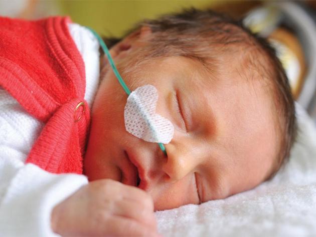 Infant under neonatal nursing care
