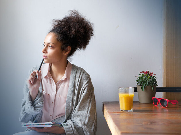 Female student sitting at a table