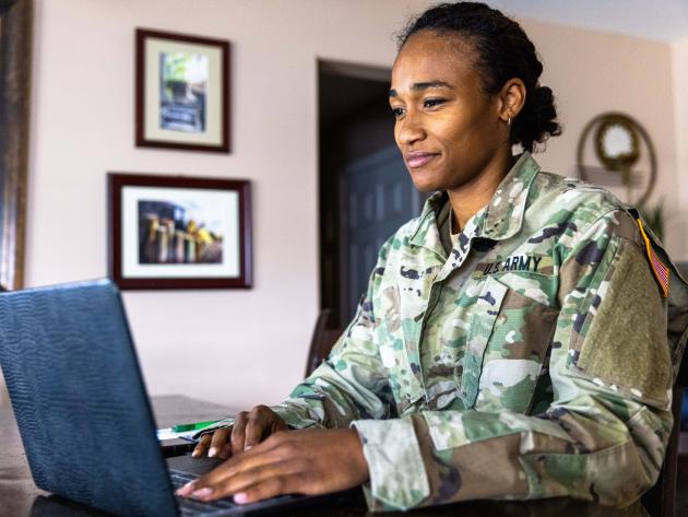  Military service member at computer searching ODUGlobal programs