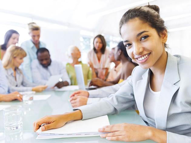 Smiling woman in a business meeting